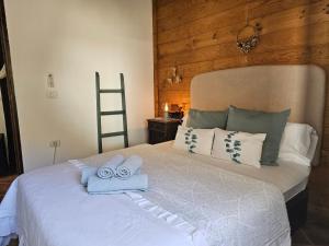 A bed or beds in a room at Casa Fuente Hervera