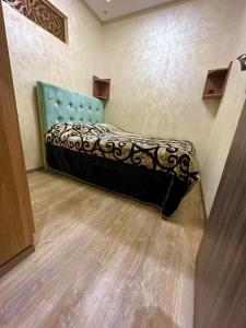 Una cama o camas en una habitación de Appartement au centre Marrakech