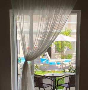 Bazén v ubytování Ermis Hotels & Resorts nebo v jeho okolí
