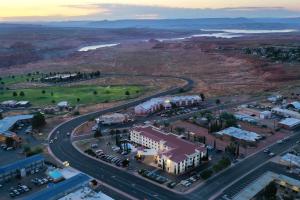 an aerial view of a city with a road and buildings at Best Western Plus At Lake Powell in Page