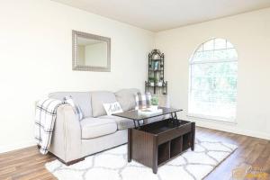 a living room with a couch and a table at Your home away from home! in Jackson