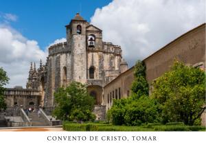 an old building with a tower on top of it at Moinho Da Pena - Alojamento Local in Bairro