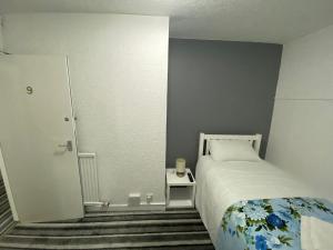 Postel nebo postele na pokoji v ubytování Aaran Central Guesthouse