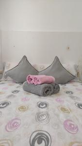 Ein Bett oder Betten in einem Zimmer der Unterkunft Dormir en Cádiz