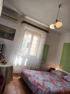 Posteľ alebo postele v izbe v ubytovaní Apartments and rooms by the sea Jelsa, Hvar - 4602