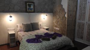 Ein Bett oder Betten in einem Zimmer der Unterkunft Dormir en Cádiz