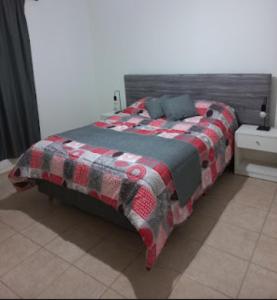 Кровать или кровати в номере El Carmelo Bed & Breakfast