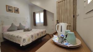 Ein Bett oder Betten in einem Zimmer der Unterkunft Dormir en Cádiz