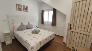 Ein Bett oder Betten in einem Zimmer der Unterkunft Dormir en Cádiz