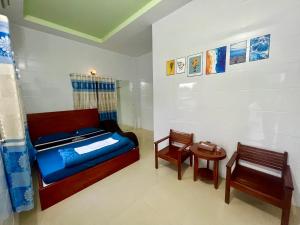 Postel nebo postele na pokoji v ubytování Huyền Anh Motel Cam Ranh + 10 fotografií