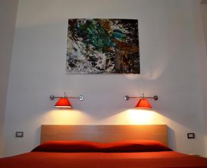 Postel nebo postele na pokoji v ubytování Hotel Cala Luna