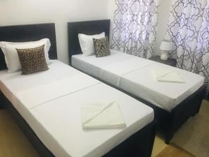 Letto o letti in una camera di Kavee Transit Hotel