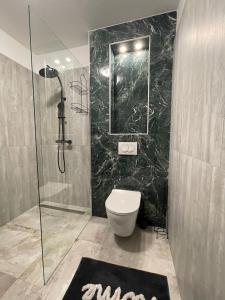 Koupelna v ubytování Apartmani Karla