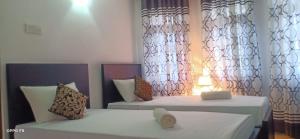 Letto o letti in una camera di Kavee Transit Hotel