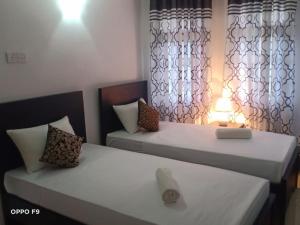 Letto o letti in una camera di Kavee Transit Hotel