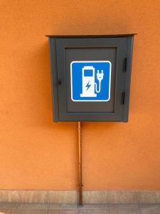 a blue sign on the side of a wall at Etna Royal View in Trecastagni