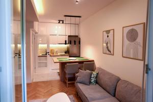 a living room with a couch and a table at Apartment 863 in Bitola