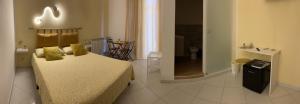 Postel nebo postele na pokoji v ubytování B&b regina del porto