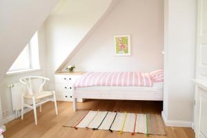 En eller flere senge i et værelse på Ostseetraum