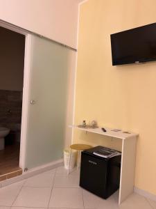 TV a/nebo společenská místnost v ubytování B&b regina del porto