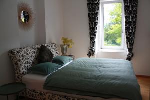 Łóżko lub łóżka w pokoju w obiekcie Apartment ANKA