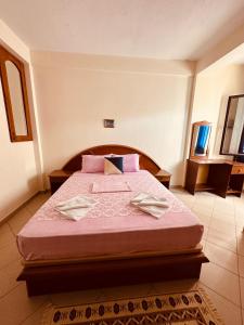 Postel nebo postele na pokoji v ubytování Hotel Saint Marena