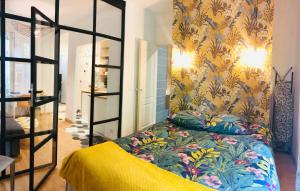 Ein Bett oder Betten in einem Zimmer der Unterkunft Appartement pied de Montmartre