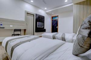 Fotografie z fotogalerie ubytování Hotel Arts International v Bombaji + 40 fotografií