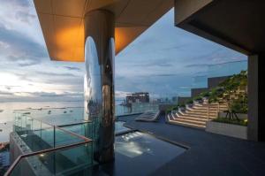 a view of a building with a swimming pool at Edge Central PATTAYA SeaView Residence in Pattaya Central