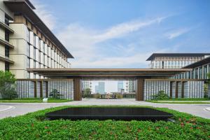 a view of a building with a circle in front of it at Element Guangzhou Baiyun in Guangzhou