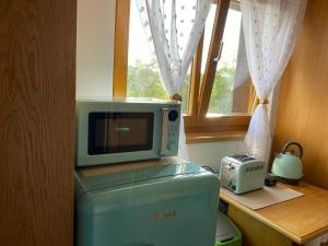 Cucina o angolo cottura di Samoobslužný hotel Vydra