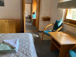 Letto o letti in una camera di Samoobslužný hotel Vydra