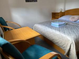 Letto o letti in una camera di Samoobslužný hotel Vydra