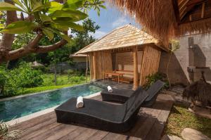 Bazén v ubytování Fivelements Retreat Bali nebo v jeho okolí