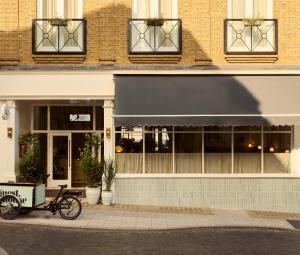 a bike parked in front of a building at No 42 by GuestHouse, Margate in Margate