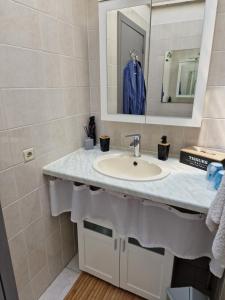a bathroom with a sink and a mirror at mignon in Soumagne +39 photos