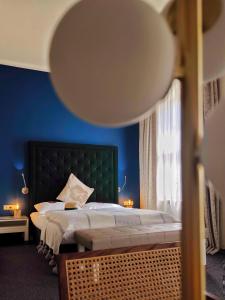 Łóżko lub łóżka w pokoju w obiekcie Hotel Villa Carlton - Adults Only