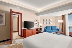 TV a/nebo společenská místnost v ubytování Ramses Hilton Hotel & Casino
