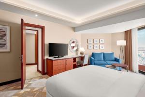 TV a/nebo společenská místnost v ubytování Ramses Hilton Hotel & Casino