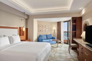 TV a/nebo společenská místnost v ubytování Ramses Hilton Hotel & Casino