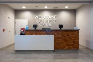 a welcome to the cheese state sign above a counter at Hampton Inn Elkhorn Lake Geneva Area in Elkhorn +41 photos