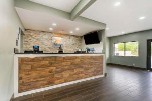 a lobby with a bar in a hospital at Suburban Studios LaVale - Cumberland in La Vale