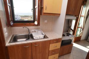 Nhà bếp/bếp nhỏ tại Fotis apartments Naxos Plaka