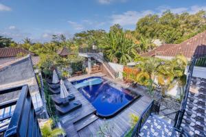 an overhead view of a swimming pool in a villa at Dyou Villa in Nusa Penida