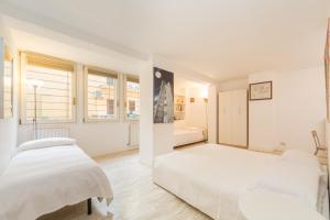 A bed or beds in a room at Cristina Rossi Bed&Breakfast