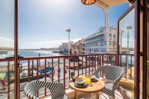 En balkon eller terrasse på MEDANO4YOU Besos Del Mar