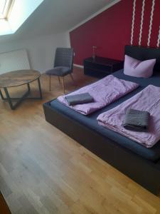 Postel nebo postele na pokoji v ubytování Gwuni B&B