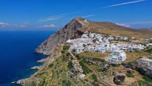 an aerial view of a village on the side of a mountain at Rustic Stone House in the Heart of Folegandros in Áno Meriá