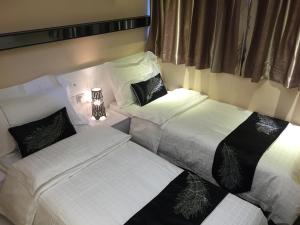 Katil atau katil-katil dalam bilik di Seasons Hotel - Causeway Bay