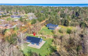 an aerial view of a house with a yard at Nice Home In Strandby With Kitchen in Strandby
